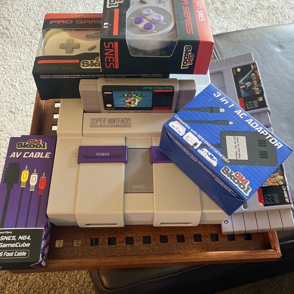 SUPER NINTENDO - original + two new controllers + cables + 3 games included.
